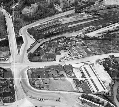 The Trebor Sweets Factory and Chesterfield Central Railway Station, Chesterfield, 1950. This image was marked by Aerofilms Ltd for photo editing.