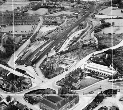 The Trebor Sweets Factory and Chesterfield Central Railway Station, Chesterfield, 1950. This image was marked by Aerofilms Ltd for photo editing.