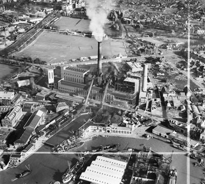 Portsmouth Power Station, Camber Dock and environs, Portsmouth, 1951. This image was marked by Aerofilms Ltd for photo editing.