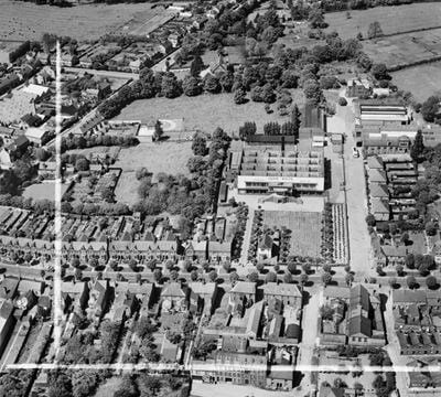 The John White Impregnable Boots Ltd Works, Rushden, 1952. This image was marked by Aerofilms Ltd for photo editing.