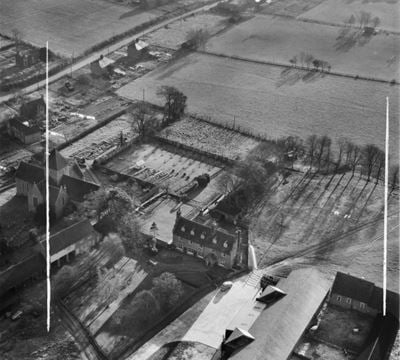 Adisham Court, Adisham, 1952. This image was marked by Aerofilms Ltd for photo editing.