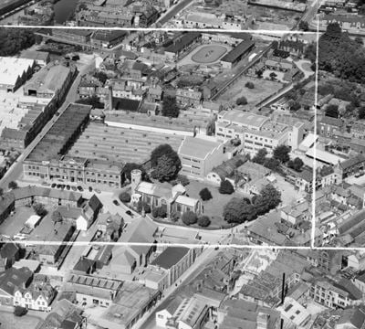 The Sexton, Son & Everard Ltd St Mary's Shoe Works alongside St Mary's Church, Norwich, 1953. This image was marked by Aerofilms Ltd for photo editing.
