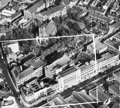 Arthur Foister and Sons Ltd (Cherub Ltd) Factory on Charles Street and St George's Church, Leicester, 1953. This image was marked by Aerofilms Ltd for photo editing.