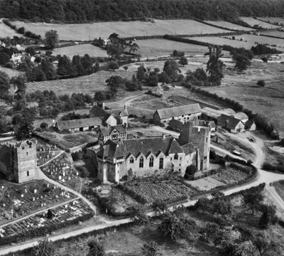Stokesay Castle, the Church of St John the Baptist and Stokecastle Farm, Stokesay, 1947. This image has been produced from a print.
