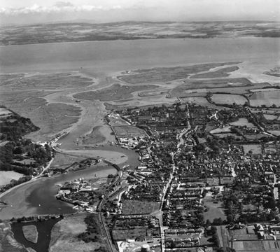 Lymington River and the town, Lymington, from the north-west, 1948. This image has been produced from a print.