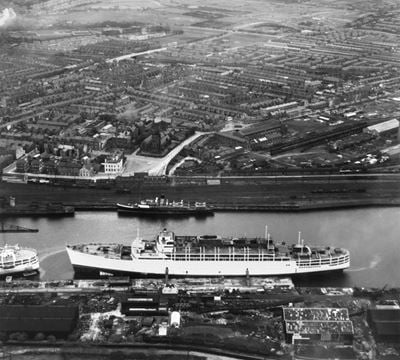 SS Himalaya moored in Buccleuch Dock, St George's Square and environs, Barrow-in-Furness, 1948. This image has been produced from a print.