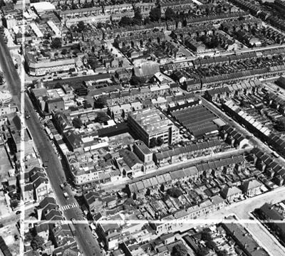 Upper Fore Street and the M.K. Electric Ltd Electrical Accessory Works, Upper Edmonton, 1949. This image has been produced from a print marked by Aerofilms Ltd for photo editing.
