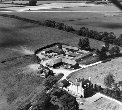 Manor Farm, Old Alresford, 1951. This image has been produced from a print marked by Aerofilms Ltd for photo editing.