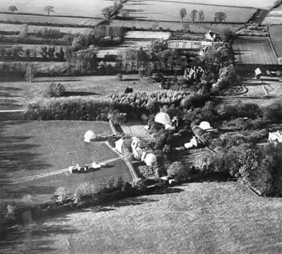 The Solar Physics Observatory alongside Sheepshanks Telescope and Newall Dome, Cambridge, 1928. This image has been produced from a copy-negative.