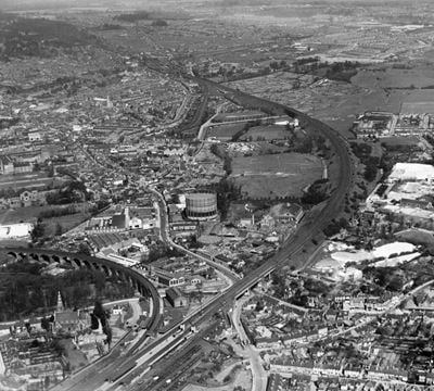 The London, Midland & Scottish Railway (LMSR) Bushey Curve, the High Street and environs, Watford, from the south-east, 1936