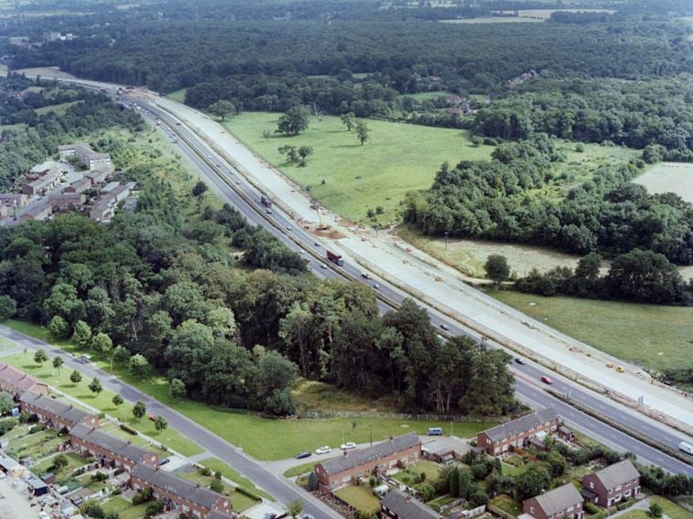 An aerial view of road widening work on the M1 near Garston, showing a new southbound carriageway under construction
