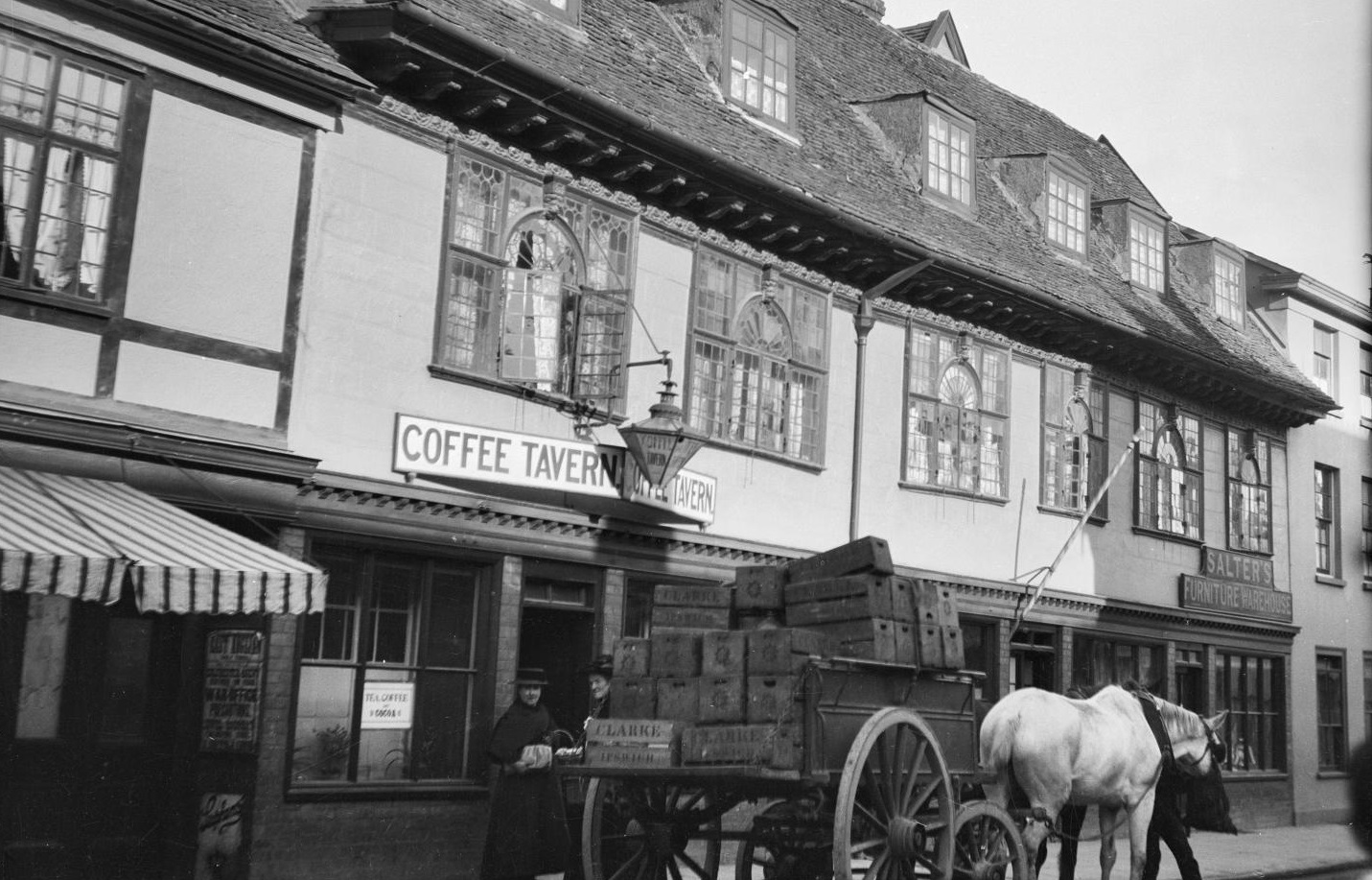 /localA horse and cart outside a house