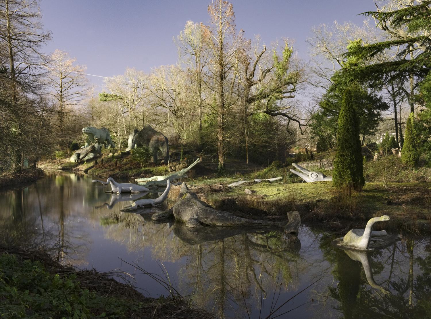 /localModels of prehistoric creatures on an island