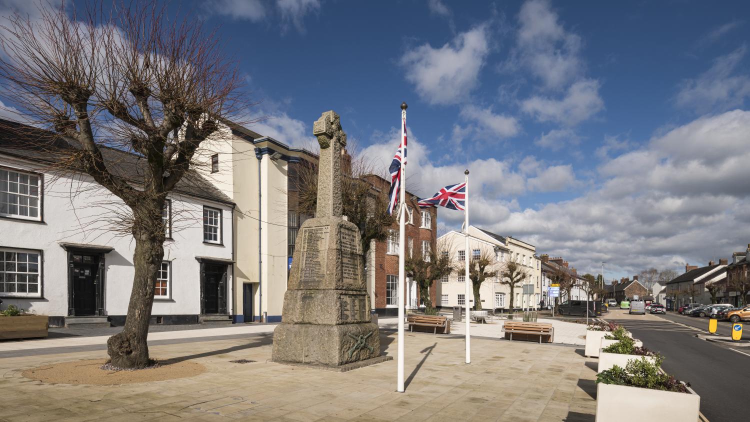 /localA war memorial cross on a street