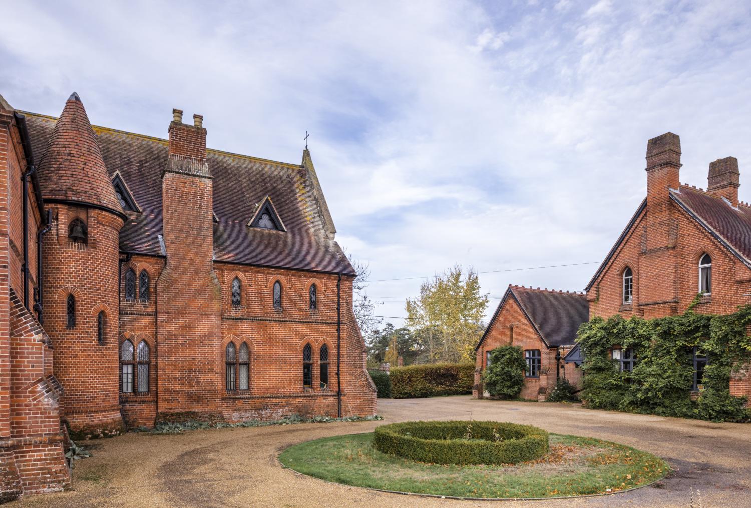 /localBuildings surround a circle of shrubs