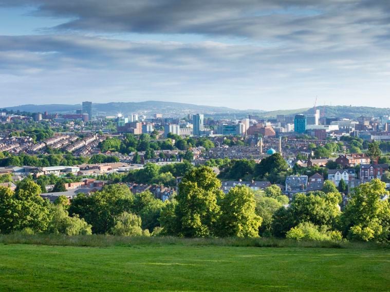/localAn aerial view over a historic park and city