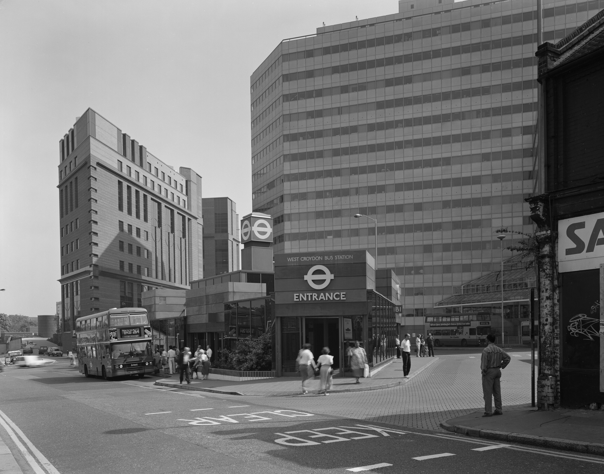 /localA bust station in front of a tower block
