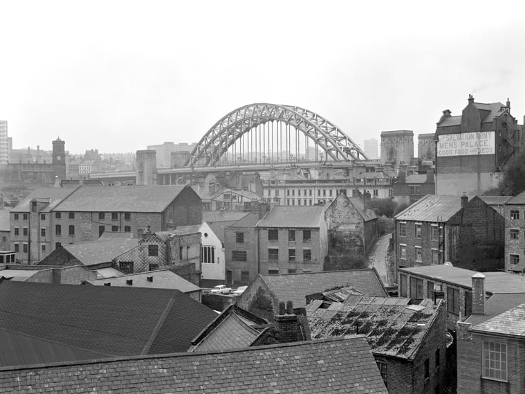 An urban view with a bridge in the background
