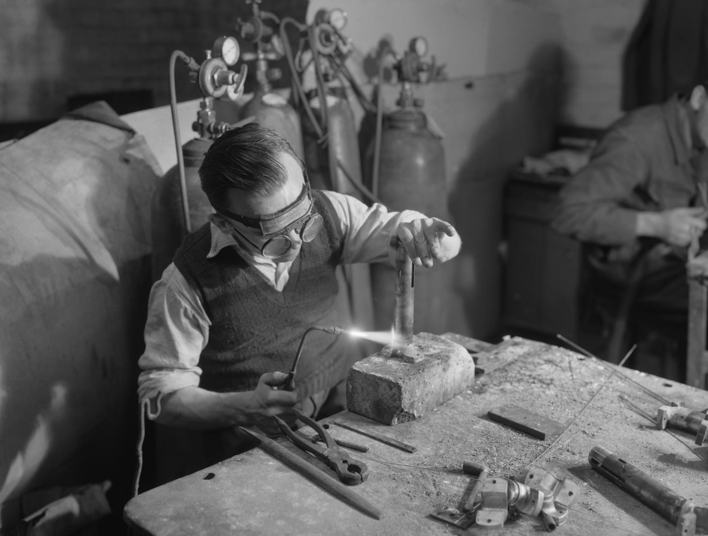 /localA man working with tools in a building
