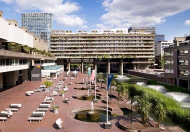 Formal canal and fountains with Gilbert House in the background, The Barbican, London
