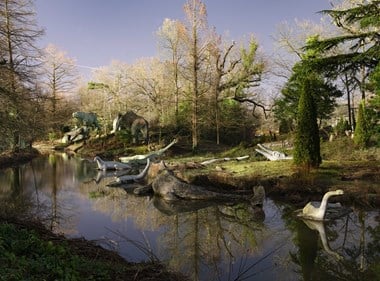 General view of dinosaurs along the lakeside