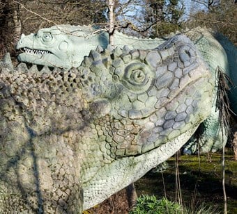 The head of an Hylaeosaurus and an Iguanodon behind