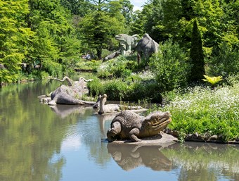 General view of the dinosaurs next to the lake