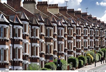 Terraced houses on Latchmere Road, Battersea, with front hedges of varying sizes and shapes.