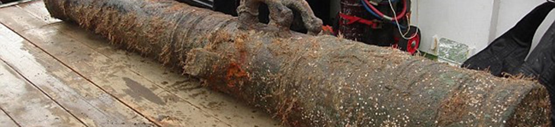 Image of a bronze cannon recovered from a historic wreck.