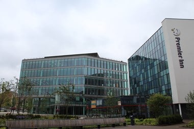 Image of the Cathedral Square at Blackburn Cathedral showing the landscaping, new office space and the hotel on the site.