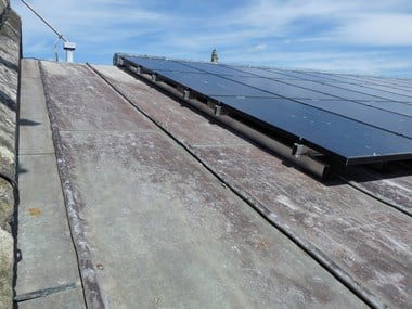 Detail of the solar panels on the nave roof.