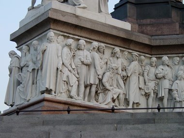 Figures carved into the base of the Albert Memorial