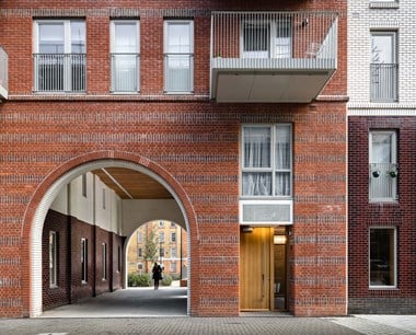 An access archway detail at an urban housing block.