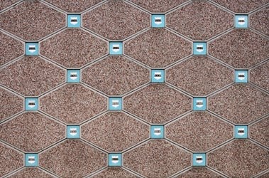 Aggregate facing on building set with diagonal lines and tiles