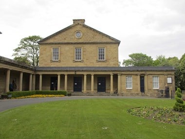 Exterior of stone building with colonnade