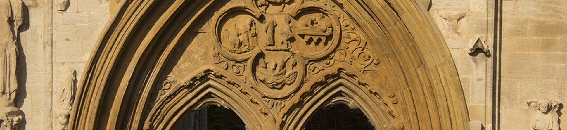Close up of some carving on an archway at scheduled and Grade I listed Crowland Abbey, Crowland.