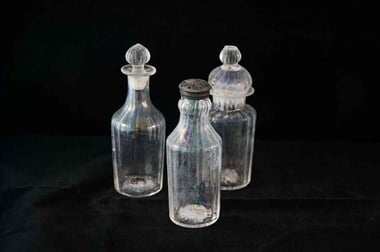 Three glass bottles