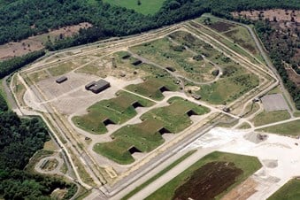 RAF Greenham Common, Berkshire, an air photograph showing the six bunkers with Ground Launched Cruise Missile Alert and Maintenance Area (GAMA) that was built in the mid-1980s to house US Ground Launched Cruise Missiles, scheduled.