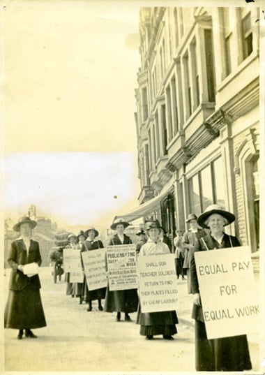 Photograph of women holding placards at NUWT equal pay demonstration
