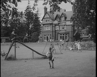 A still from the Pathé film No Longer Alone, filmed at Overlea Hall, an RNIB Sunshine Home. 