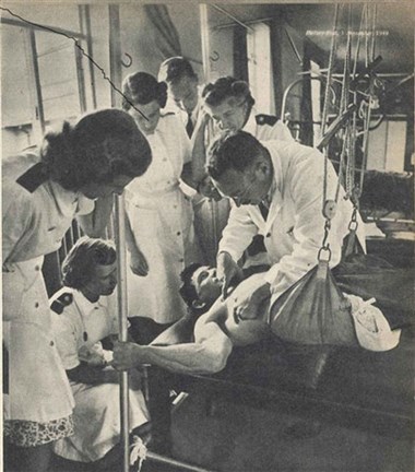 Ludwig Guttman 'doing the rounds' at Stoke Mandeville Hospital. 