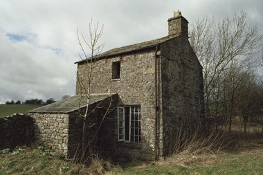 Orton Raisbeck Dame School, Cumbria, where Mrs Alice Whitehead taught church catechism, reading, knitting and sewing in 1858. This modest late C18 building of coursed, squared rubble with quoins and a slate roof is listed at Grade II.
© Ian Campbell (2003). Source Historic England. NMR.