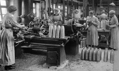 Women working machinery