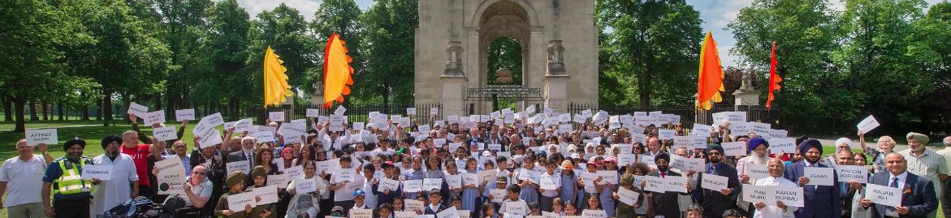 School children in Leicester attending a remembrance event for the Indian Labour Corp at Lutyen's Memorials at Leicester's Victoria Park and New Delhi's India Gate.