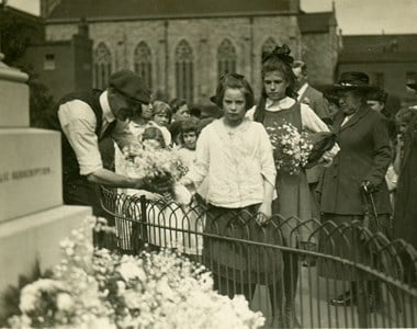 Local children at the unveiling of the memorial at Poplar Recreation Ground, London Borough of Tower Hamlets, 23 June 1919. The memorial has been upgraded to Grade II*