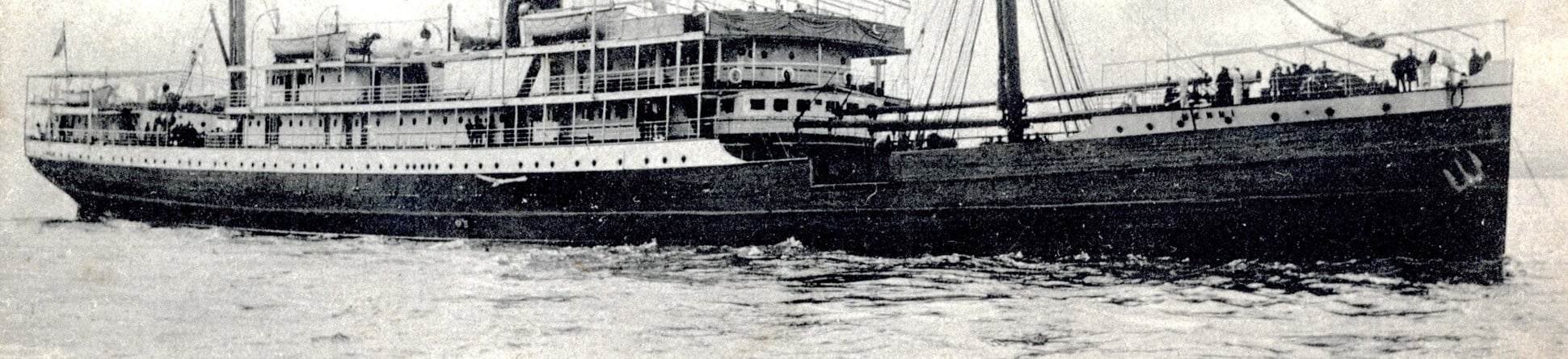 The Mendi was built in Glasgow and in 1905 registered to the British & African Steam Navigation Co Ltd. She is shown here in pre-war days in use as a mail ship. Image courtesy of the John Gribble Collection