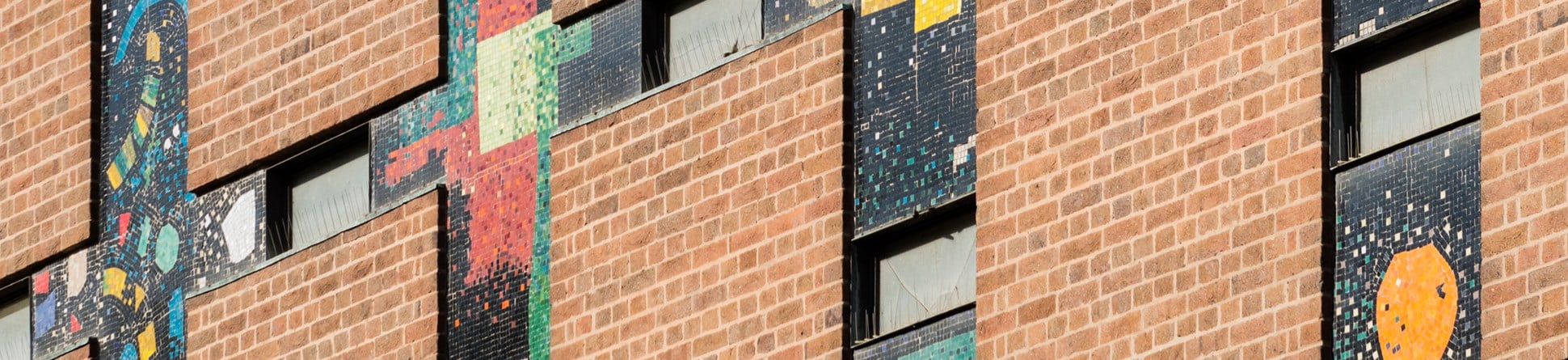 Locarno dancehall (now City Library), Smithford Way, Coventry. Exterior detail of coloured mosaic tiles. © Historic England