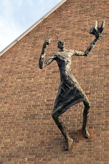 The Preacher by Peter Laszlo Peri, 1961. On Forest Gate Methodist Church, Woodgrange Road, Forest Gate, London. Listed Grade II © Historic England