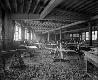 Hampton & Sons Ltd, Lambeth, London July 1916 Workers manufacturing aircraft wooden propellers for bi-planes. (BL23561/039)