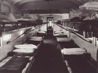 Ambulance train. During the war, standard railway carriages were converted into ambulance cars. As shown here in a carriage interior, even the luggage racks were converted into beds. (Swindon Railway Museum BB94/5297) 